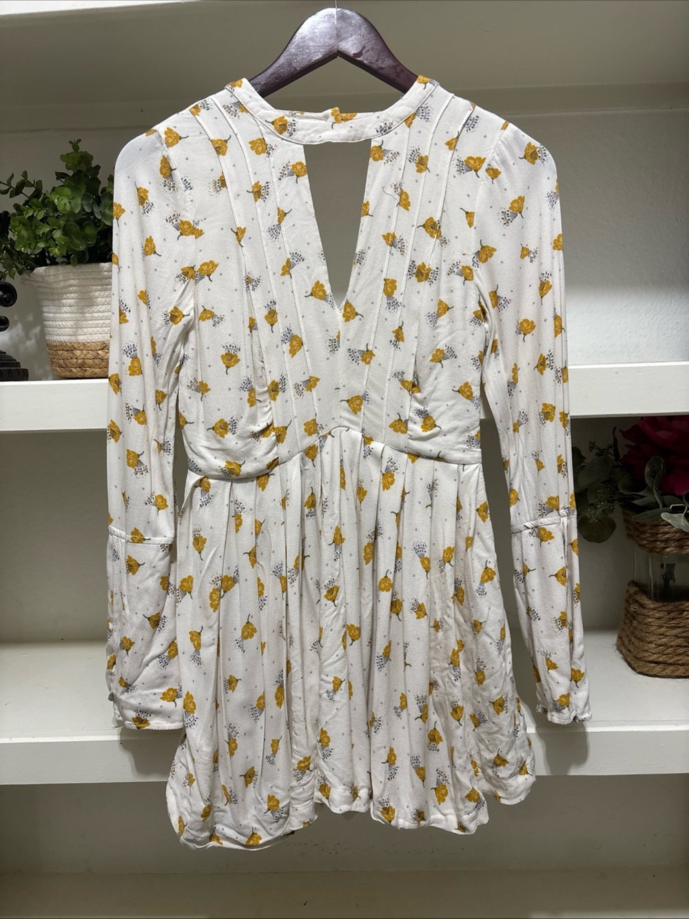 Free People Yellow and white floral dress with long bell sleeves Size 2